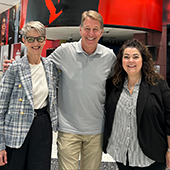 Lisa Henderson and Susannah Gergich visit with Scott Russell (MA'85, Journalism) at the CBC building in Toronto.